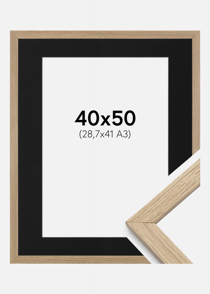 Acquista Cornice Stilren Vetro acrilico Rovere 40x50 cm - Passe-partout Nero  29,7x42 cm qui 